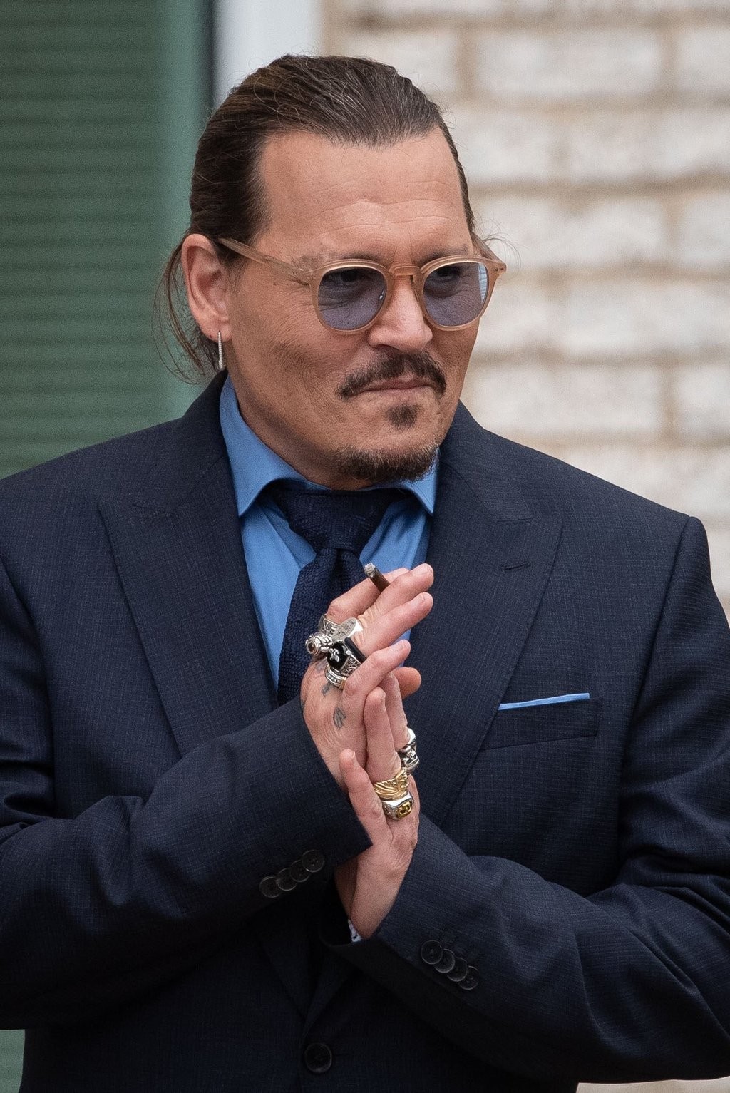 Johnny Depp gestures to his fans during a recess outside court during his civil trial against Amber Heard at Fairfax County Circuit Court on May 27, in Fairfax, Virginia. Photo: Consolidated News Pictures/Getty Images Johnny Depp gestures to his fans during a recess outside court during his civil trial against Amber Heard at Fairfax County Circuit Court on May 27, in Fairfax, Virginia. Photo: Consolidated News Pictures/Getty Images