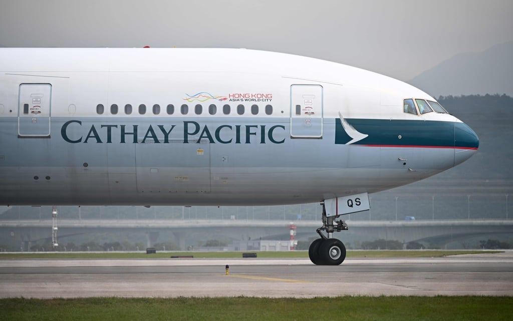 The logo is seen on a Cathay Pacific passenger plane. File photo: AFP The logo is seen on a Cathay Pacific passenger plane. File photo: AFP