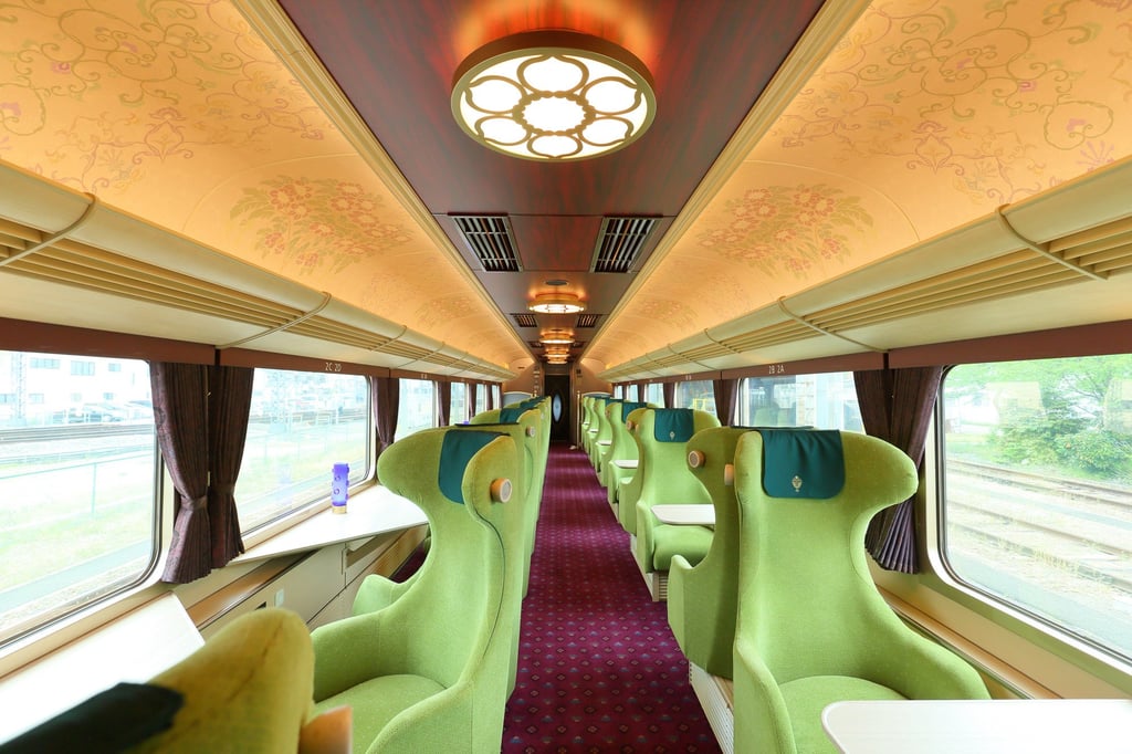 Tenpyo Era patterns decorate the interior on the Aoniyoshi Sightseeing Limited Express. Photo: Kintetsu Railway Tenpyo Era patterns decorate the interior on the Aoniyoshi Sightseeing Limited Express. Photo: Kintetsu Railway