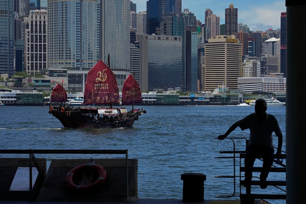 A Chinese junk sails across Victoria Harbor to celebrate the 25th anniversary of Hong Kong’s handover to China in June. The city’s cruise industry desperately needs to break free from too stringent coronavirus restrictions to get back on its feet. Photo: AP A Chinese junk sails across Victoria Harbor to celebrate the 25th anniversary of Hong Kong’s handover to China in June. The city’s cruise industry desperately needs to break free from too stringent coronavirus restrictions to get back on its feet. Photo: AP