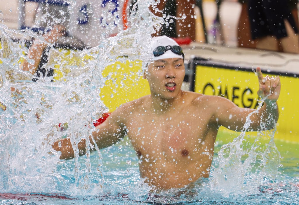 Hayden Kwan celebrates his city record in the 100m backstroke at Victoria Park. Photo: Dickson Lee Hayden Kwan celebrates his city record in the 100m backstroke at Victoria Park. Photo: Dickson Lee