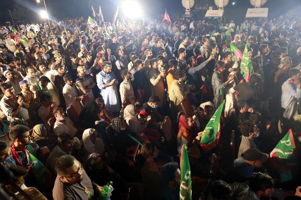 Supporters of opposition party Pakistan Tehrik-e-Insaf listen to Khan’s speech in Islamabad on Saturday. Photo: EPA-EFE Supporters of opposition party Pakistan Tehrik-e-Insaf listen to Khan’s speech in Islamabad on Saturday. Photo: EPA-EFE