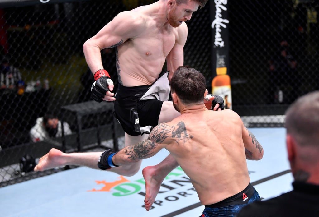 Cory Sandhagen knocks Frankie Edgar out with a flying knee in February, 2021. Photo: Zuffa LLC Cory Sandhagen knocks Frankie Edgar out with a flying knee in February, 2021. Photo: Zuffa LLC