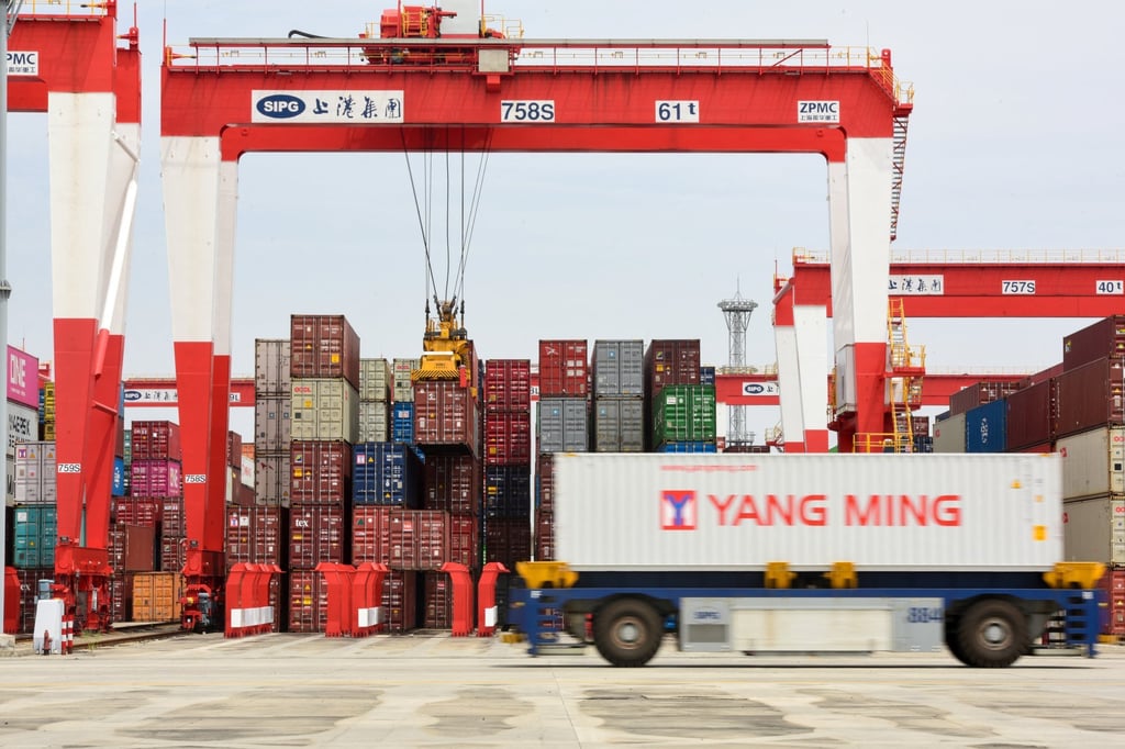 An automated guided vehicle transports a container at the Yangshan Deep Water Port in Shanghai. Photo: Reuters An automated guided vehicle transports a container at the Yangshan Deep Water Port in Shanghai. Photo: Reuters