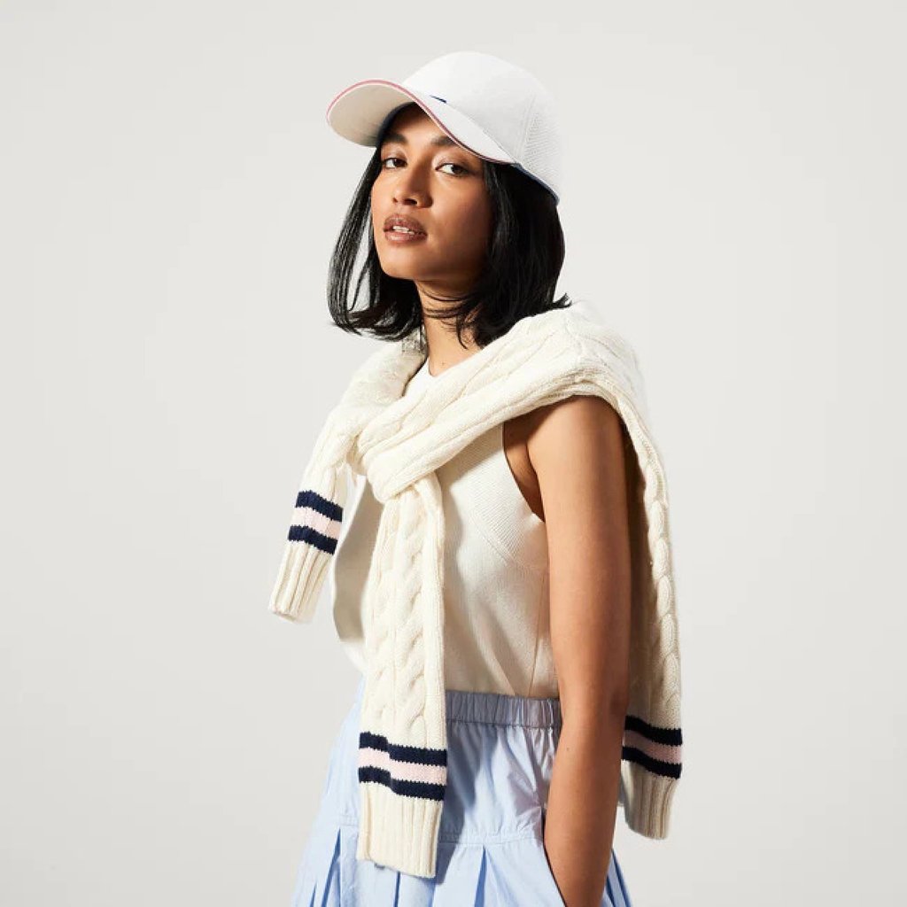 How many water bottles went into each Rothy’s piece? The cap was made from five. Photo: Rothy’s How many water bottles went into each Rothy’s piece? The cap was made from five. Photo: Rothy’s