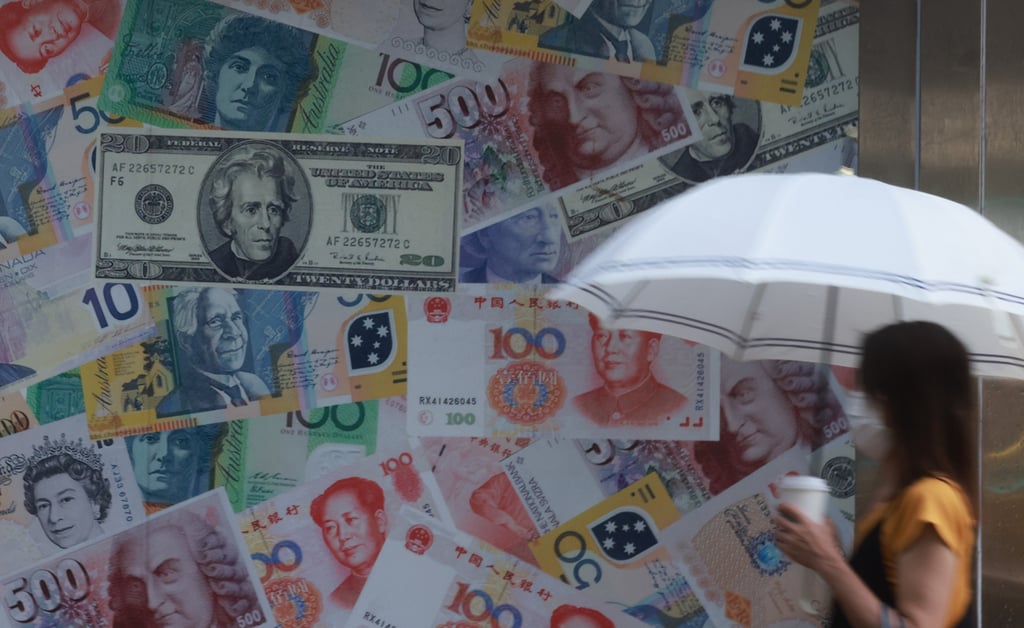 A hoarding with foreign currencies in Sheung Wan. The US dollar is strengthening, forcing the Hong Kong Monetary Authority to enter the currency market to defend the local currency. Photo: May Tse