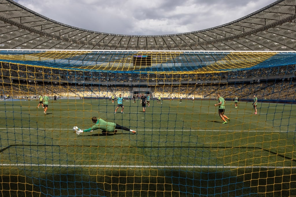 Players of Shakhtar Donetsk warm up before the opening soccer match of the new season of Ukrainian Premier League. Photo: EPA-EFE