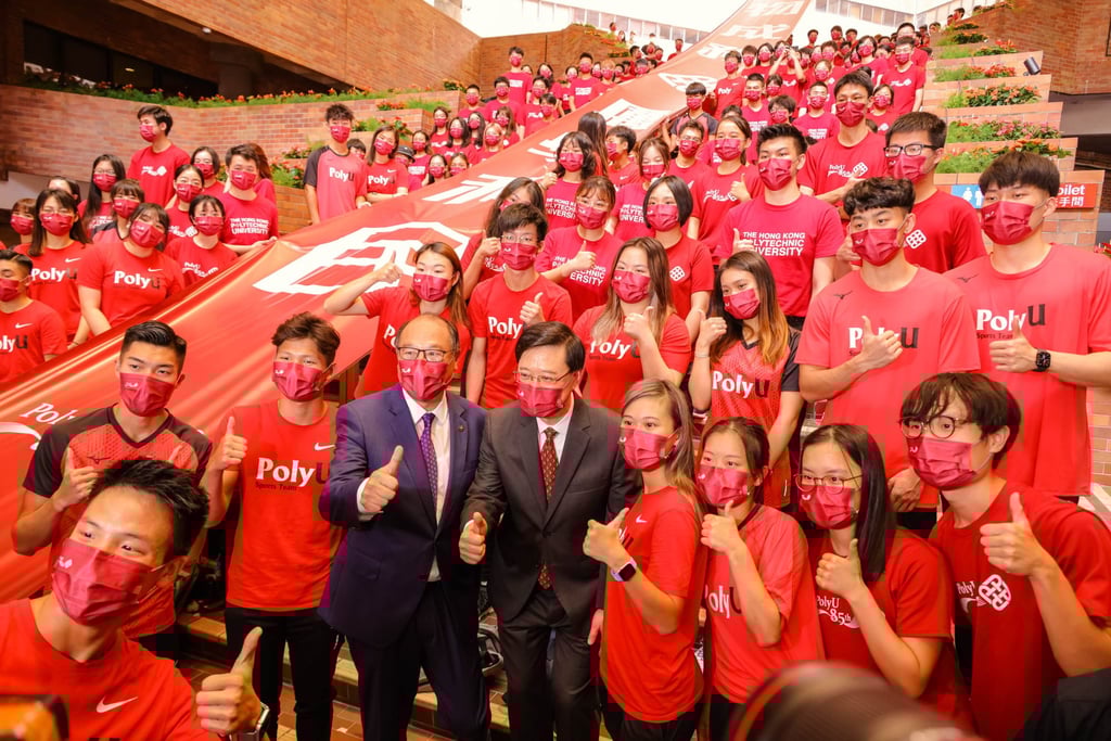 Chief Executive John Lee and PolyU council chairman Dr Lam Tai-fai at the unveiling ceremony for the university’s new main entrance. Photo: PolyU
