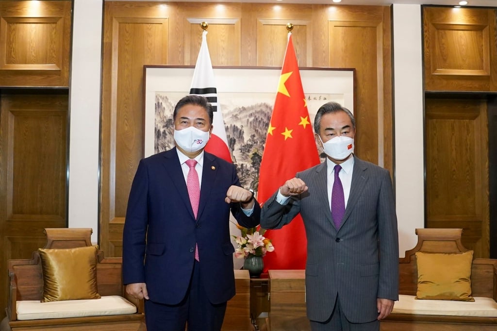 South Korean Foreign Minister Park Jin (left) meets his Chinese counterpart Wang Yi in Qingdao, China on August 9. Photo: AP South Korean Foreign Minister Park Jin (left) meets his Chinese counterpart Wang Yi in Qingdao, China on August 9. Photo: AP
