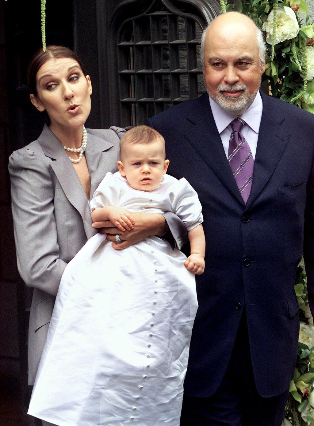 Singer Celine Dion and her husband, René Angélil, hold their six-month-old son René-Charles after his baptism in Montreal, in 2001. Photo: AP Singer Celine Dion and her husband, René Angélil, hold their six-month-old son René-Charles after his baptism in Montreal, in 2001. Photo: AP