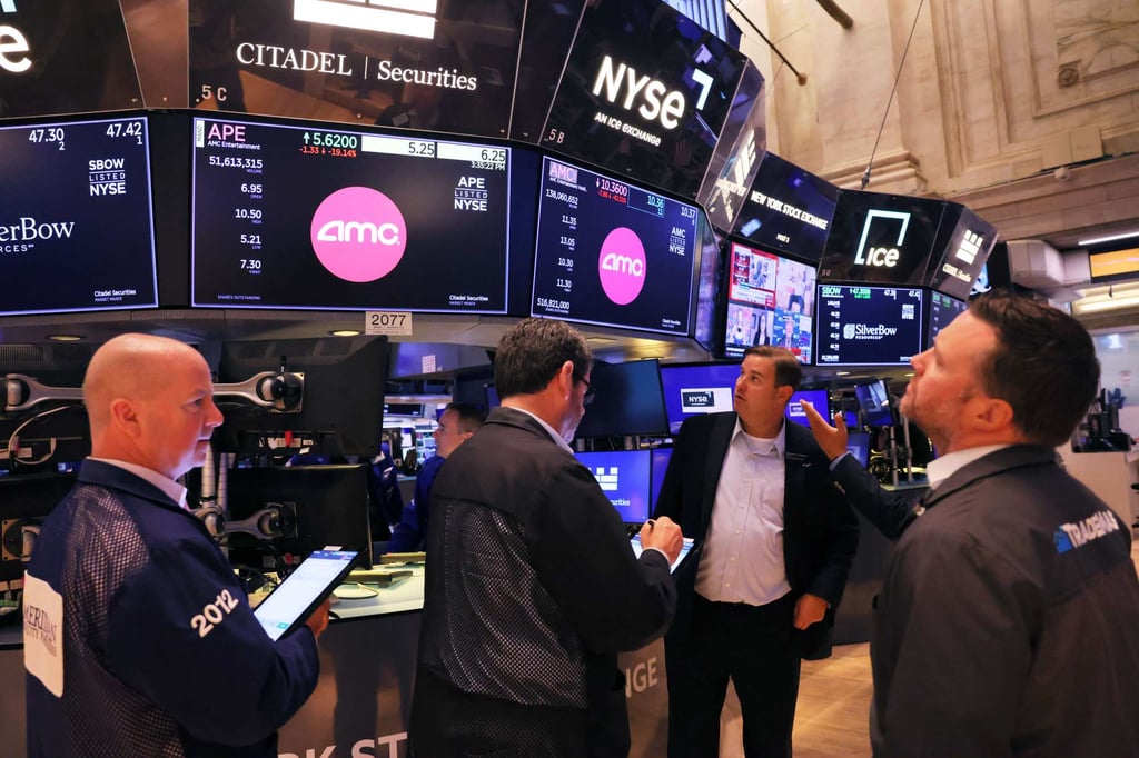 Traders work on the floor of the New York Stock Exchange on Monday. Photo: AFP