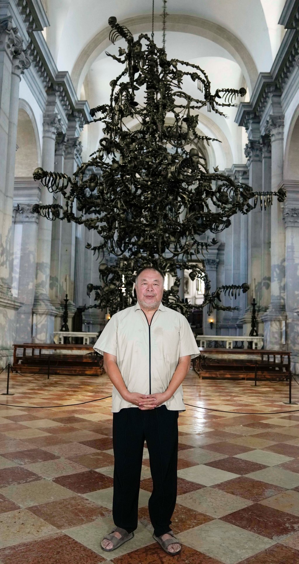 Ai poses in front of “Memento Mori”. Photo: AP Ai poses in front of “Memento Mori”. Photo: AP