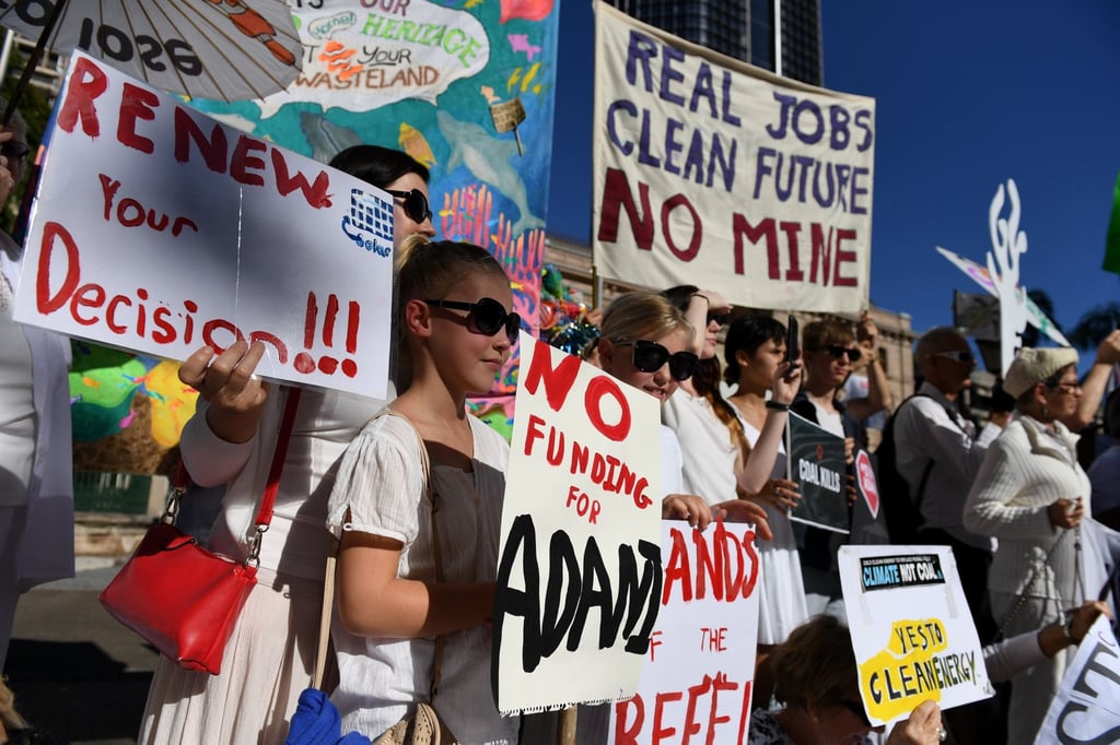 Environmental activists protest in Brisbane against the Carmichael coal mine in 2017. Photo: EPA