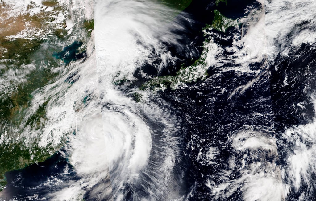 Super Typhoon Hinnamnor, lower left, is seen moving gradually northward into the East China Sea in this composite image released by Nasa. Photo: Nasa Worldview, EOSDIS via AP