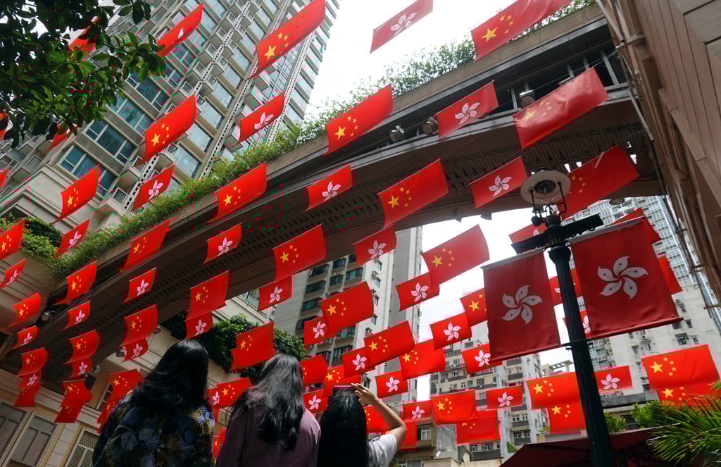 Chinese and Hong Kong flags are hung to mark the 25th anniversary of Hong Kong’s return to Chinese rule on July 1. Photo: Reuters Chinese and Hong Kong flags are hung to mark the 25th anniversary of Hong Kong’s return to Chinese rule on July 1. Photo: Reuters