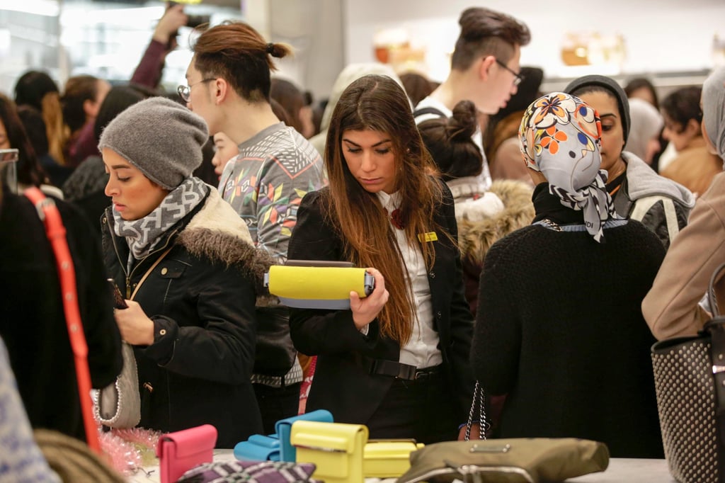 Customers looks at handbags on display in the mixed handbags sales inside the Selfridges department store during the Boxing Day sale on Oxford Street in London, UK, in 2015. Photo: Bloomberg