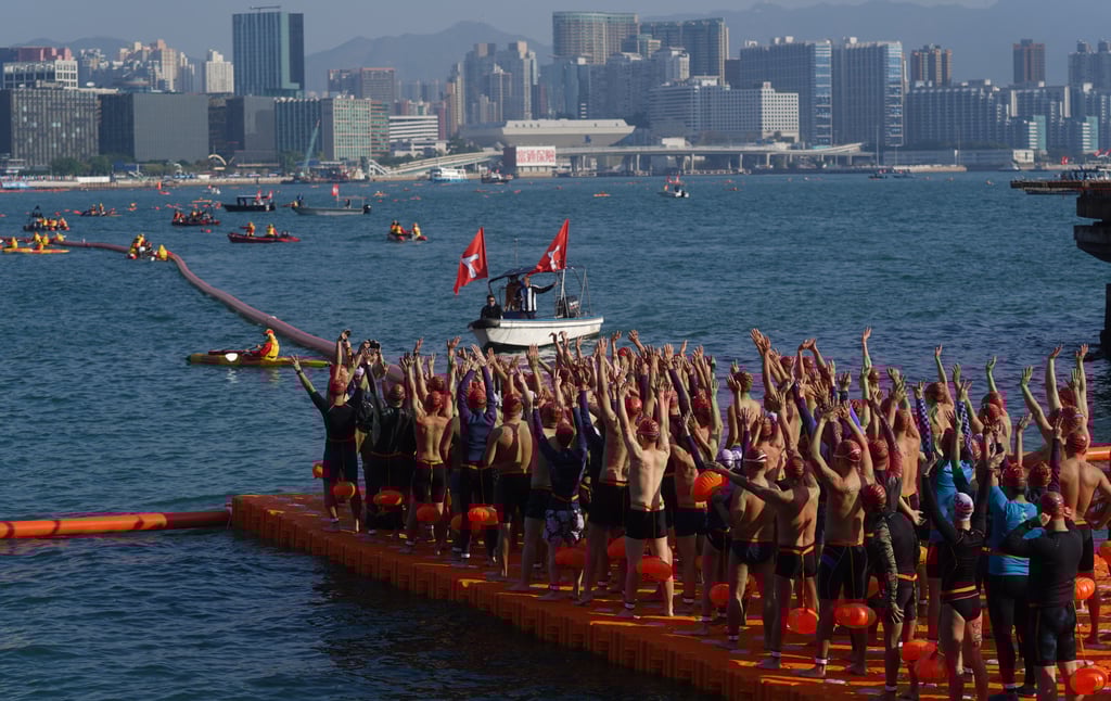 Participants prepare to launch themselves into Victoria Harbour for the 2021 race. Photo: Sam Tsang Participants prepare to launch themselves into Victoria Harbour for the 2021 race. Photo: Sam Tsang