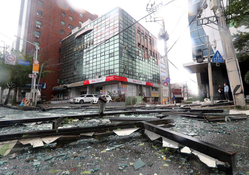 Debris from a damaged hospital caused by Typhoon Hinnamnor is seen on a street in Ulsan, South Korea, on Tuesday. Photo: Yonhap via AP Debris from a damaged hospital caused by Typhoon Hinnamnor is seen on a street in Ulsan, South Korea, on Tuesday. Photo: Yonhap via AP