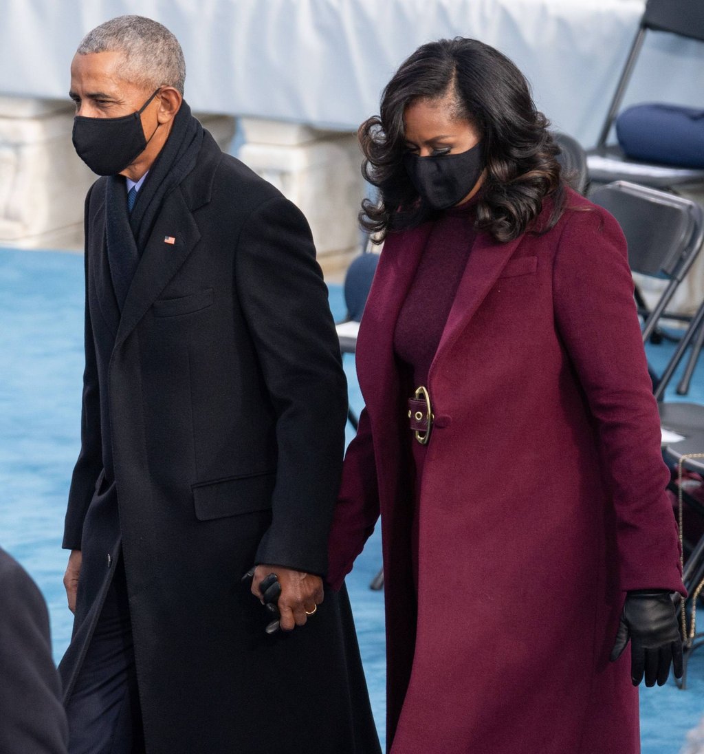 Former US president Barack Obama and former first lady Michelle Obama arrive for Joe Biden’s inauguration. Michelle Obama wore a plum coat. Photo: Pool/AFP Former US president Barack Obama and former first lady Michelle Obama arrive for Joe Biden’s inauguration. Michelle Obama wore a plum coat. Photo: Pool/AFP
