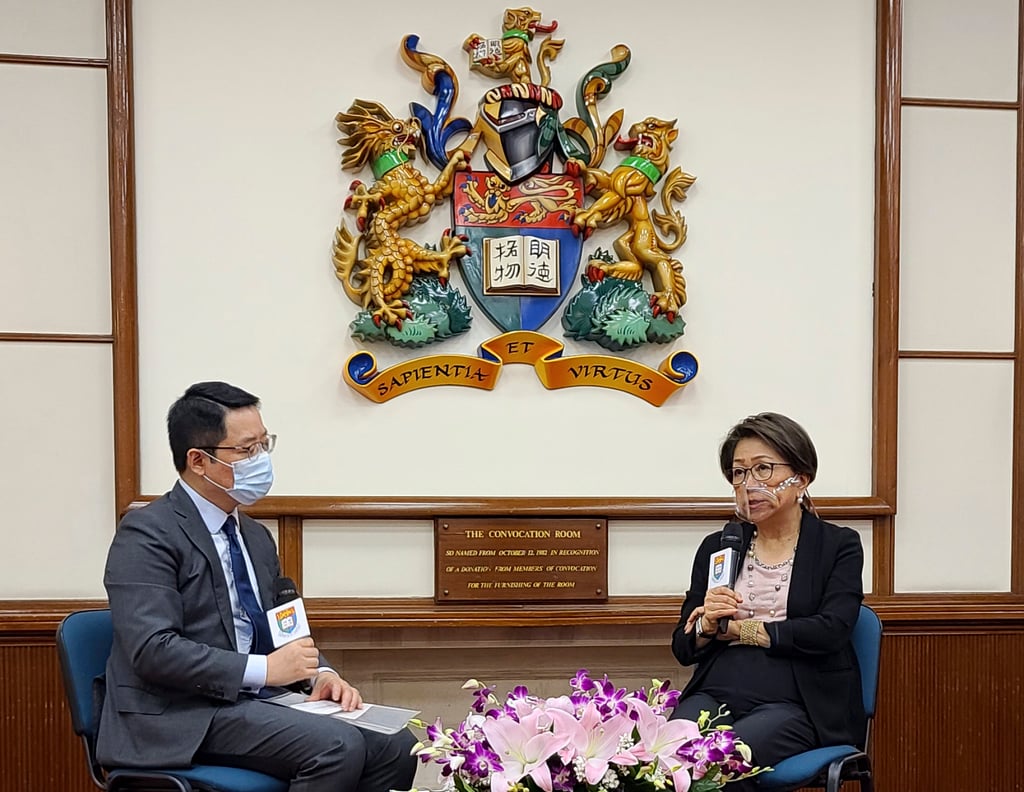 Laura Cha Shih May-lung, chairwoman of Hong Kong Exchanges and Clearing (right), speaks with Yan Xiaojun, director of the Research Hub on Institutions of China at The University of Hong Kong during a forum on September 7, 2022. Photo: SCMP / Enoch Yiu