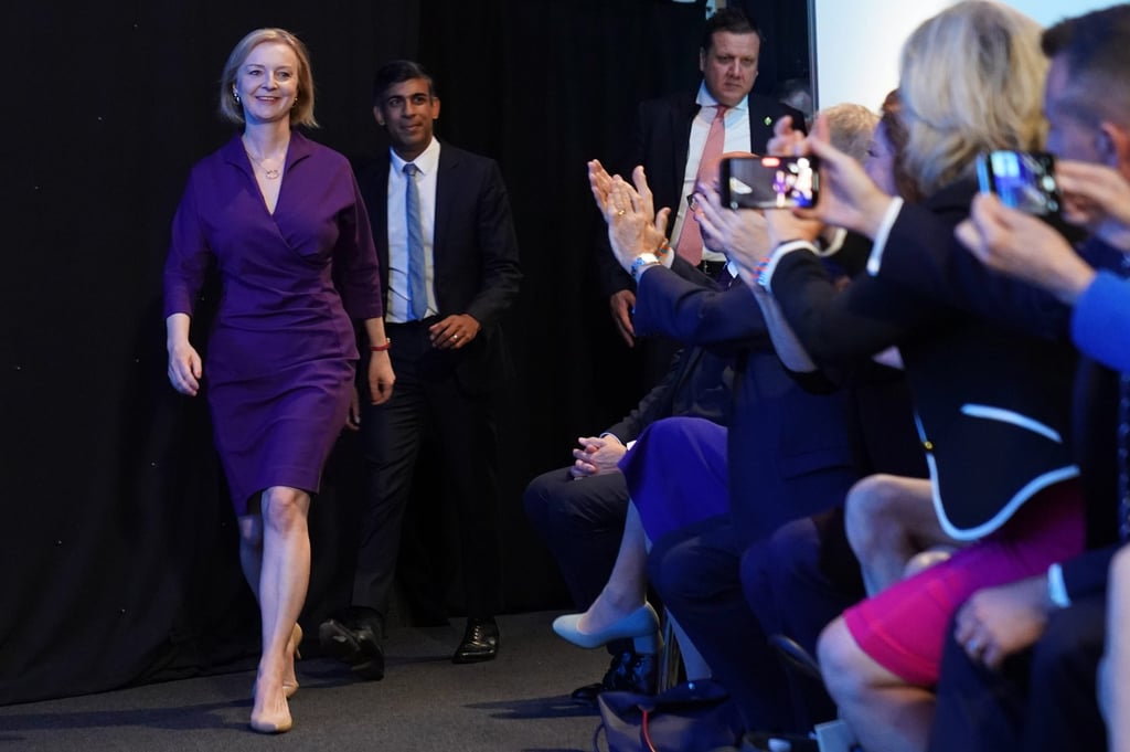 Liz Truss in a purple dress after winning the Conservative Party leadership. Photo: EPA-EFE Liz Truss in a purple dress after winning the Conservative Party leadership. Photo: EPA-EFE