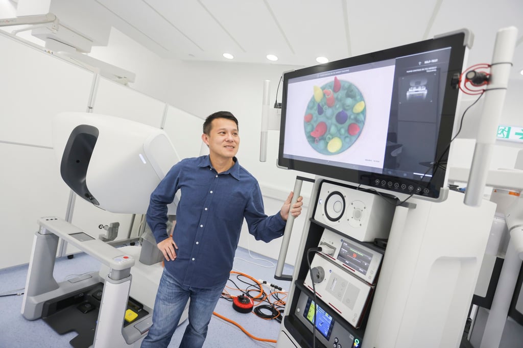 Founder of Cornerstone Robotics and Spirit of Hong Kong Awards 2022 nominee Samuel Au, with a CSR Robot, at his centre at the Science Park in Sha Tin. Photo: Jonathan Wong Founder of Cornerstone Robotics and Spirit of Hong Kong Awards 2022 nominee Samuel Au, with a CSR Robot, at his centre at the Science Park in Sha Tin. Photo: Jonathan Wong