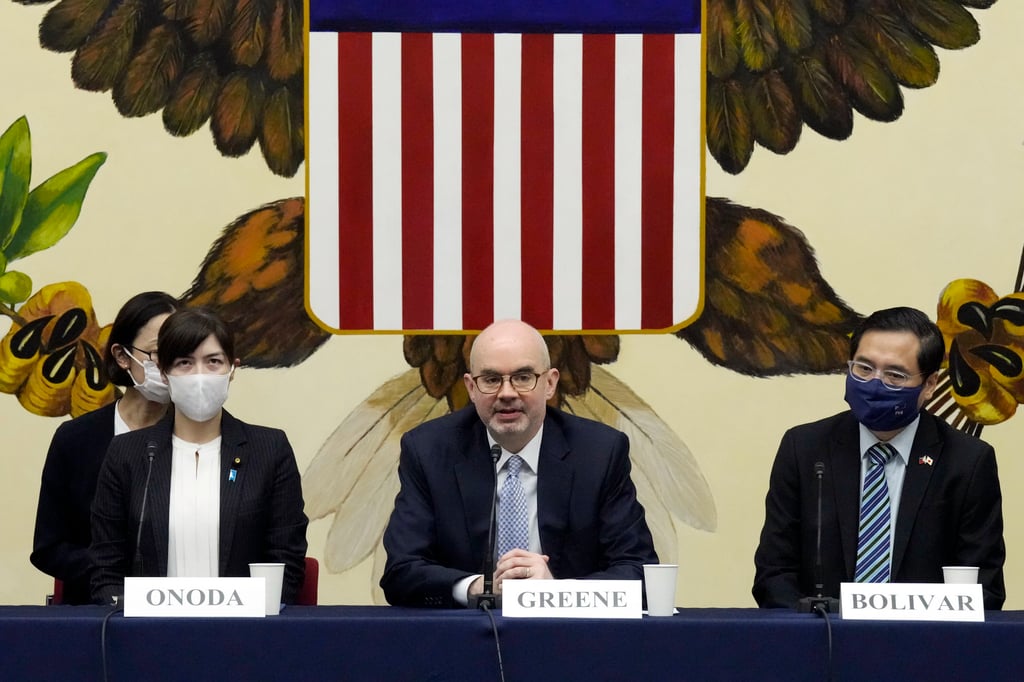 US envoy Raymond Greene (centre) with Japanese vice-minister of defence Kimi Onoda (left) and Philippine envoy Robespierre Bolivar (right) in Tokyo on Tuesday. Photo: AP