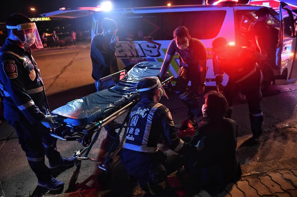Volunteer rescuers treat a woman at the scene of a road accident near Bangkok in 2020. Thailand’s roads were named as the deadliest in Southeast Asia by the World Health Organization in 2018. Photo: AFP Volunteer rescuers treat a woman at the scene of a road accident near Bangkok in 2020. Thailand’s roads were named as the deadliest in Southeast Asia by the World Health Organization in 2018. Photo: AFP