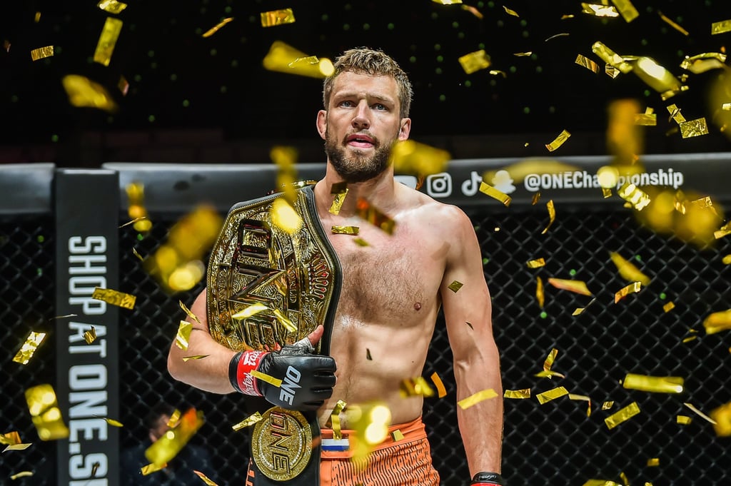 Reinier de Ridder celebrates after retaining his middleweight title at ONE 159.