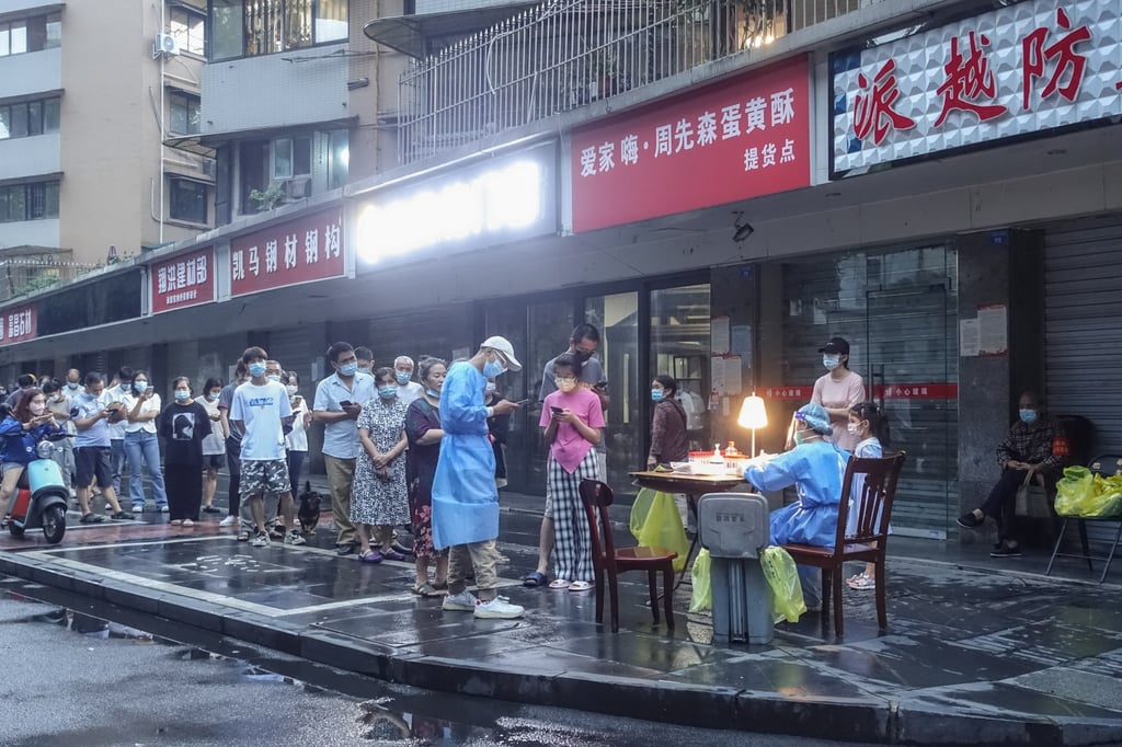 People line up for Covid-19 testing in Chengdu. Photo: EPA-EFE People line up for Covid-19 testing in Chengdu. Photo: EPA-EFE