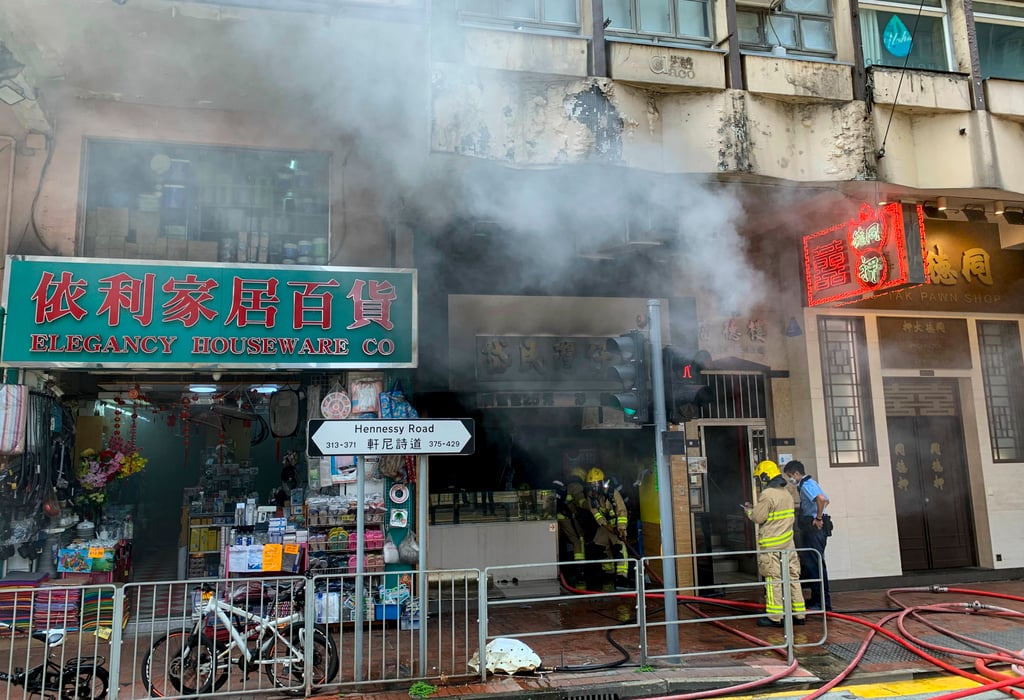 The shop was gutted by the fire. Photo: Warton Li The shop was gutted by the fire. Photo: Warton Li