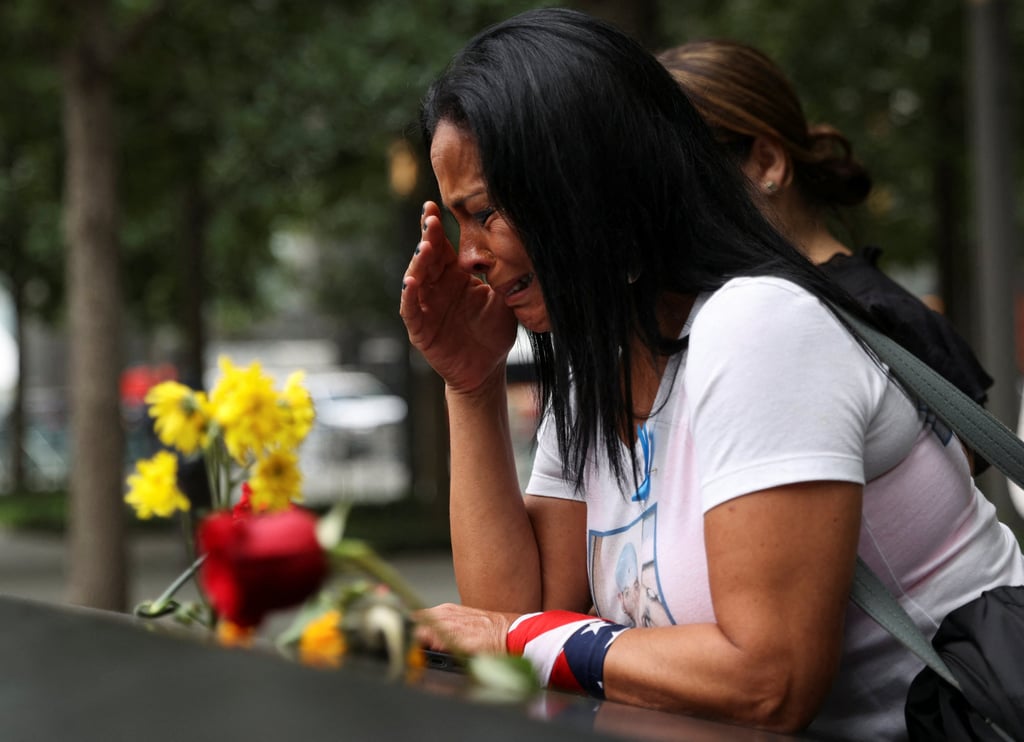 A woman reacts during a ceremony in New York City on Sunday marking the 21st anniversary of the September 11, 2001 attacks. Photo: Reuters