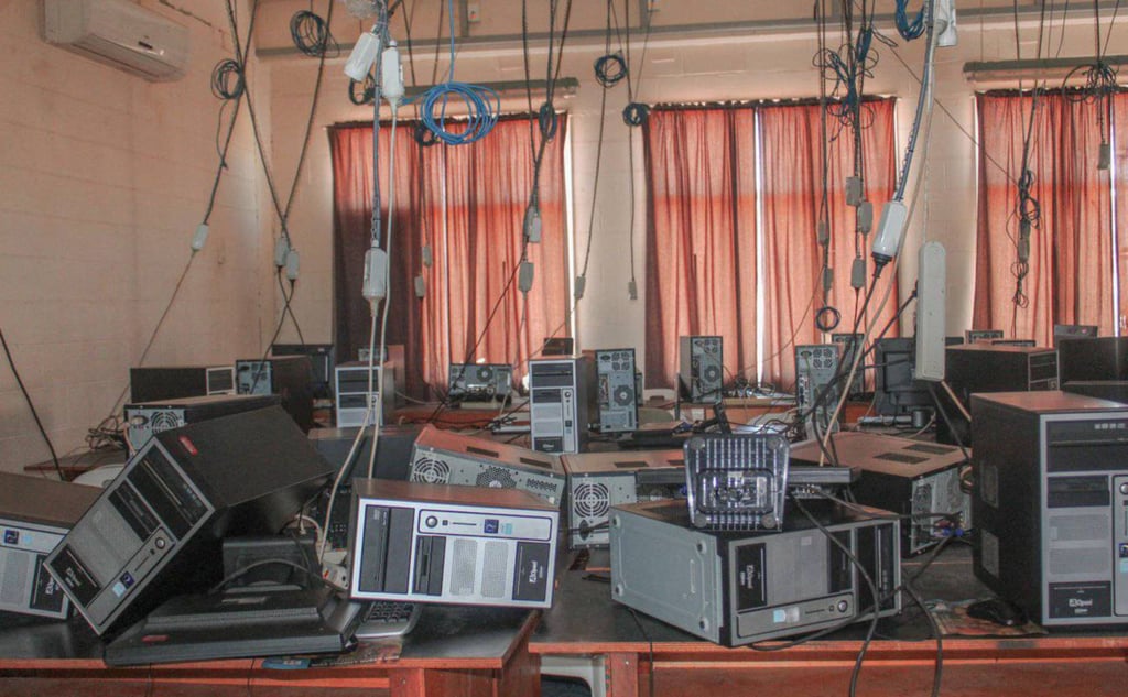 Fallen equipment in a computer room at a school near the city of Lae following a 7.6-magnitude earthquake off Papua New Guinea’s coast. Photo: Photo: AFP/WanNaiks Gallery