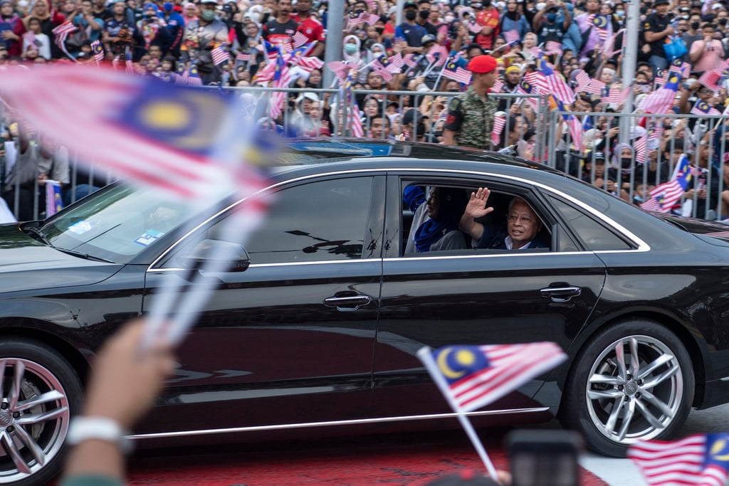 Malaysian Prime Minister Ismail Sabri Yaakob waves to the crowds during National Day celebrations in Kuala Lumpur last month. Photo: Bernama via dpa