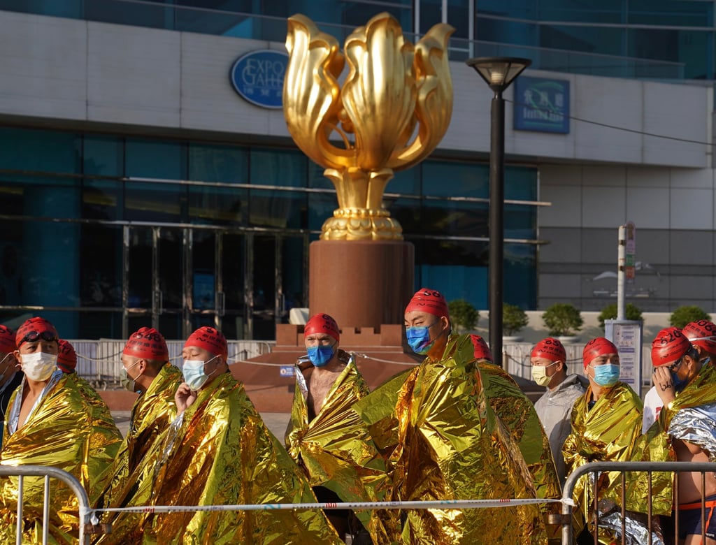 Swimmers in the Public Pier at Golden Bauhinia Square in Wan Chai. Photo: Sam Tsang Swimmers in the Public Pier at Golden Bauhinia Square in Wan Chai. Photo: Sam Tsang