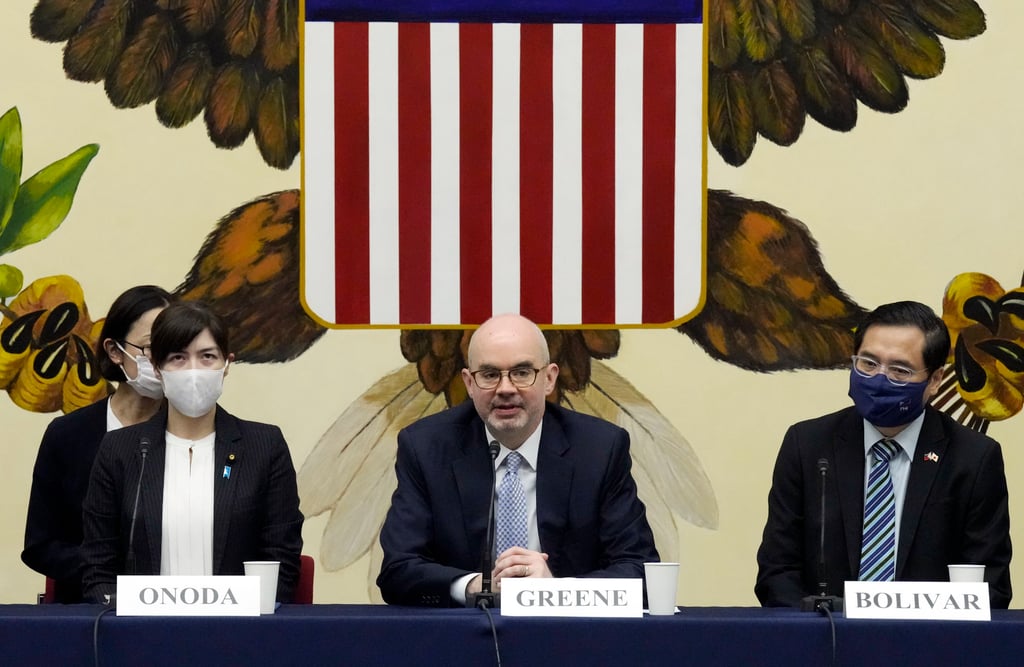 US Deputy Chief of Mission Raymond Greene (centre) with Japanese Vice-Minister of Defence Kimi Onoda (left) and Philippine Chargé d’Affaires Robespierre Bolivar (right) in Tokyo on Tuesday. Photo: AP