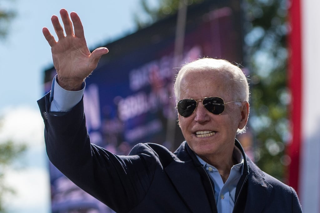 Joe Biden smiles as he acknowledges the crowd at the end of his speech a high school in North Carolina during a campaign stop in October 2020. Photo: AFP Joe Biden smiles as he acknowledges the crowd at the end of his speech a high school in North Carolina during a campaign stop in October 2020. Photo: AFP