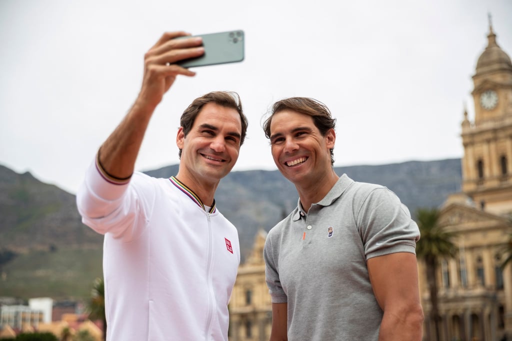 Roger Federer and Rafael Nadal take a selfie after playing mini tennis on the Cape Town Grand Parade in front of the City Hall and Table Mountain ahead of their exhibition match in South Africa in February 2020. Photo: EPA-EFE Roger Federer and Rafael Nadal take a selfie after playing mini tennis on the Cape Town Grand Parade in front of the City Hall and Table Mountain ahead of their exhibition match in South Africa in February 2020. Photo: EPA-EFE
