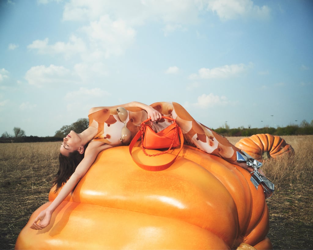 The womenswear was presented among and upon the leather pumpkins of acclaimed British artist Anthea Hamilton.