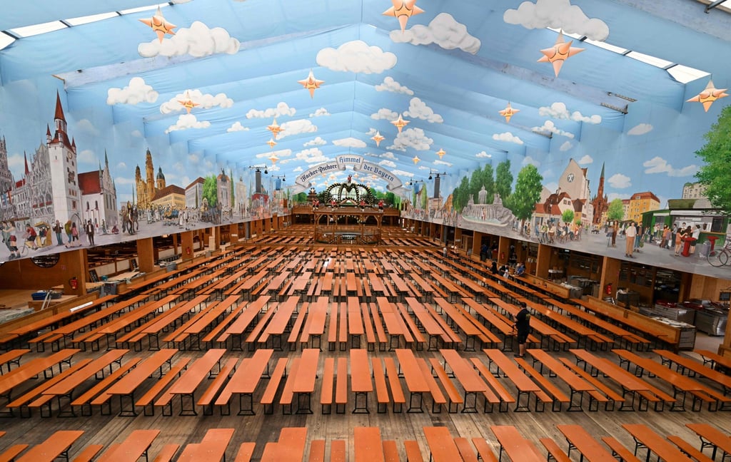 An empty festival tent ahead of the coming Oktoberfest beer festival at the Theresienwiese fair grounds in Munich, southern Germany. The world renowned beer festival is to take place from September 17 to October 3 without access restrictions, after the past two years’ editions had been cancelled due to the coronavirus pandemic. Photo: AFP
