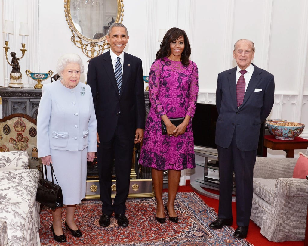 Queen Elizabeth stands with then president and first lady of the United States Barack Obama and his wife Michelle, along with the Duke of Edinburgh, in the Oak Room at Windsor Castle ahead of a private lunch hosted by the queen. Photo: EPA