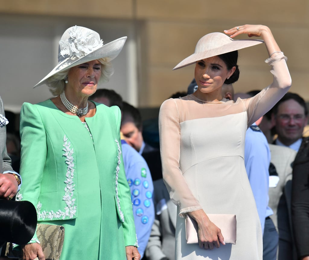 Meghan, Duchess of Sussex attends a garden party at Buckingham Palace, with Camilla, Duchess of Cornwall, in London, Britain, in May 2018. Photo: Reuters