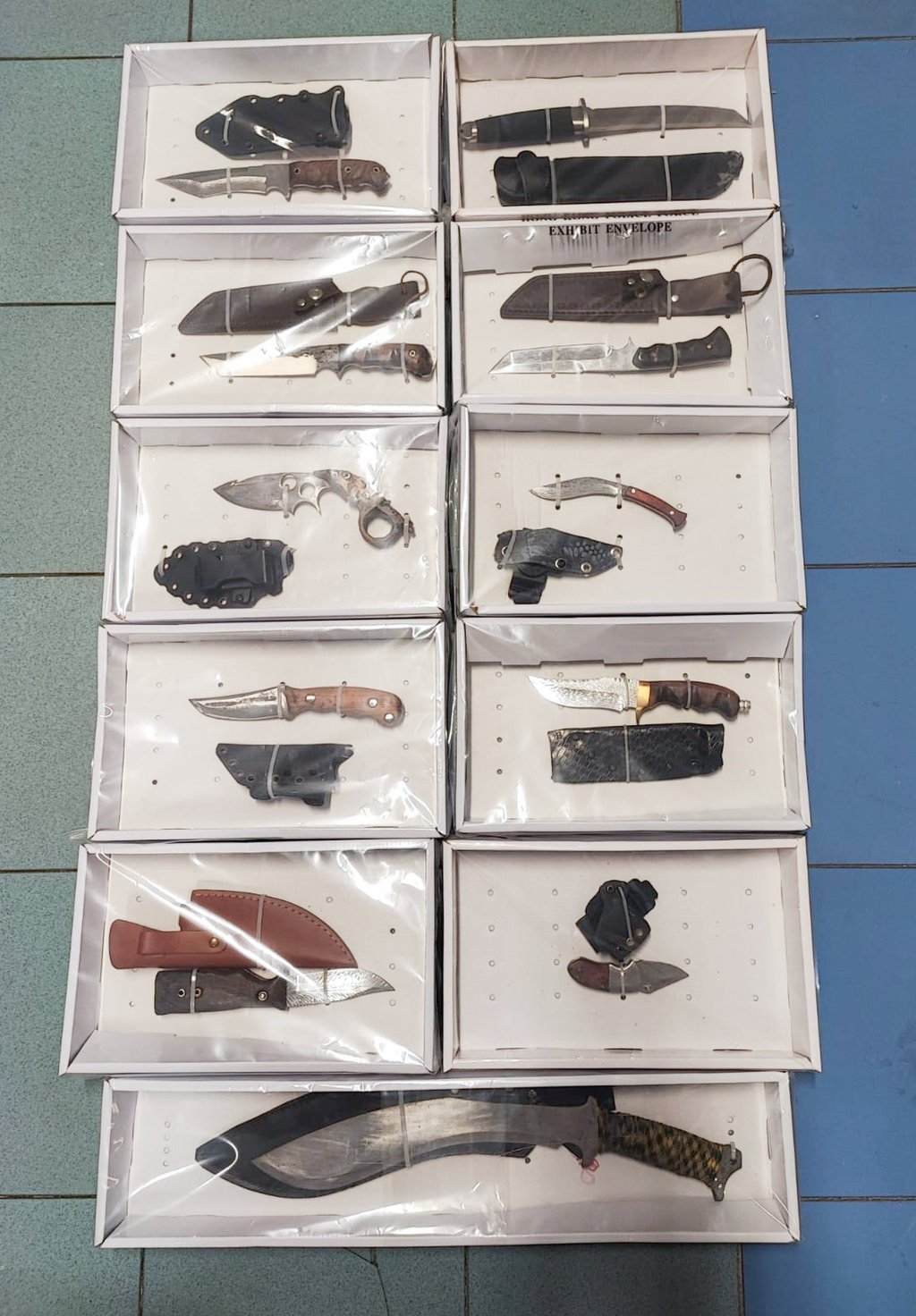The knives and other weapons discovered by police are believed to be part of an arsenal for gang fights. Photo: Handout The knives and other weapons discovered by police are believed to be part of an arsenal for gang fights. Photo: Handout