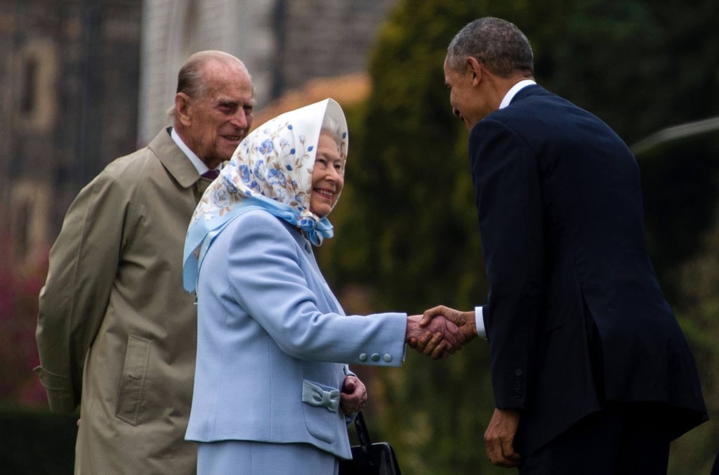 Britain’s Queen Elizabeth and her husband Prince Philip, Duke of Edinburgh greet then US President Barack Obama after he and his wife Michelle arrived by helicopter outside Windsor Castle, west of London, in April 2016. Photo: AFP