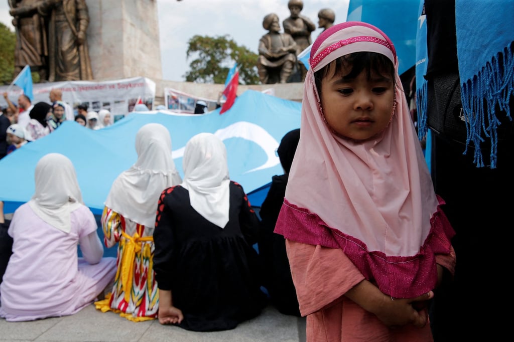 Ethnic Uygur women and girls attend a protest against China last month in Istanbul, Türkiye. Photo: Reuters