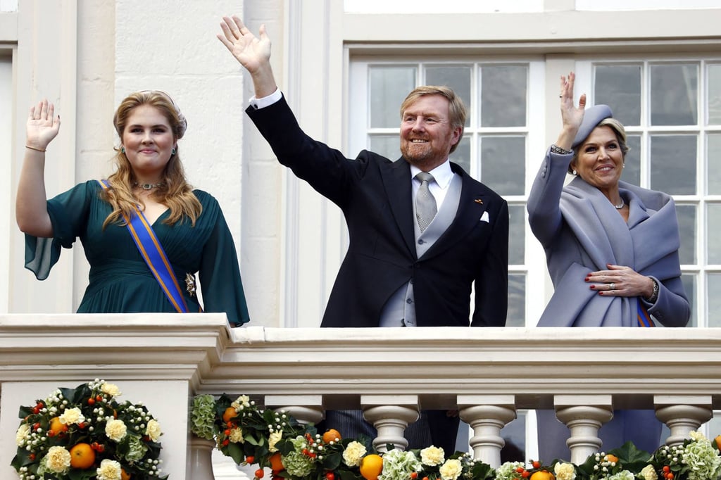 Netherlands’ Crown Princess Catharina-Amalia, King Willem-Alexander and Queen Máxima wave from the Noordeinde Palace, on September 20. Photo: Agence France-Presse