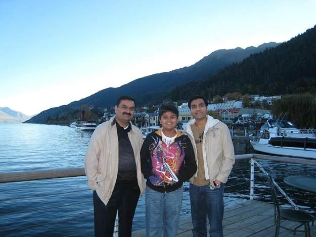 Gautam Adani with his sons Jeet Adani and Karan Adani. Photo: @AdaniKaran/Twitter