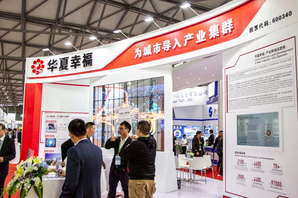People visit a China Fortune Land Development (CFLD) booth during an exposition in Shanghai on March 20, 2019. Photo: Handout People visit a China Fortune Land Development (CFLD) booth during an exposition in Shanghai on March 20, 2019. Photo: Handout