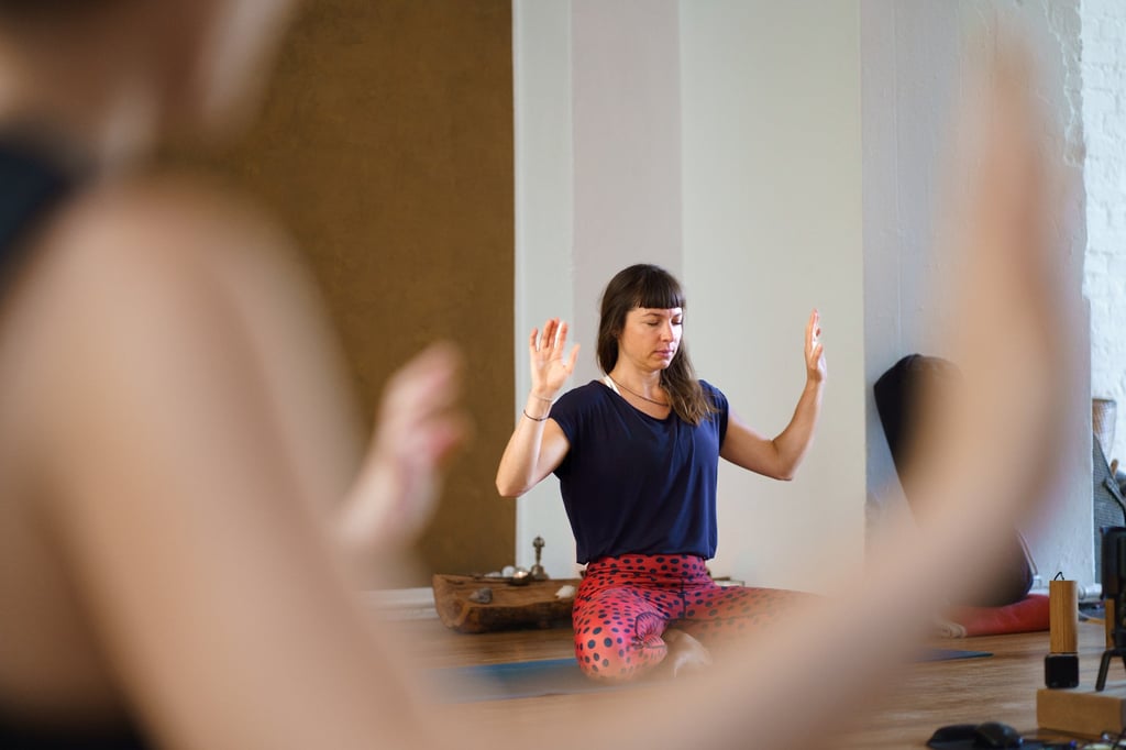 Classes in Yellow Yoga’s Sonnenallee branch are ethnically diverse, with Middle Eastern migrants, European expatriates and locals. Photo: Kolette Lim