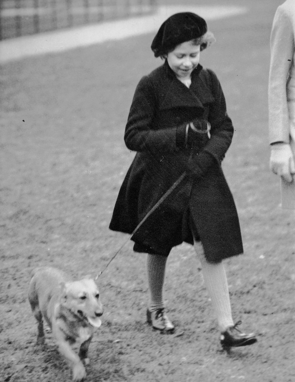 Then Princess Elizabeth takes her pet dog for a walk in London’s Hyde Park, in 1936. Photo: AP Photo Then Princess Elizabeth takes her pet dog for a walk in London’s Hyde Park, in 1936. Photo: AP Photo